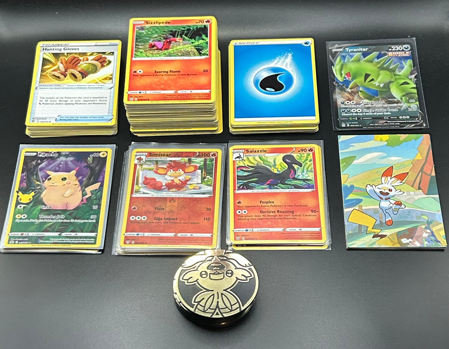 5 Mini Tins including 4 special holo cards