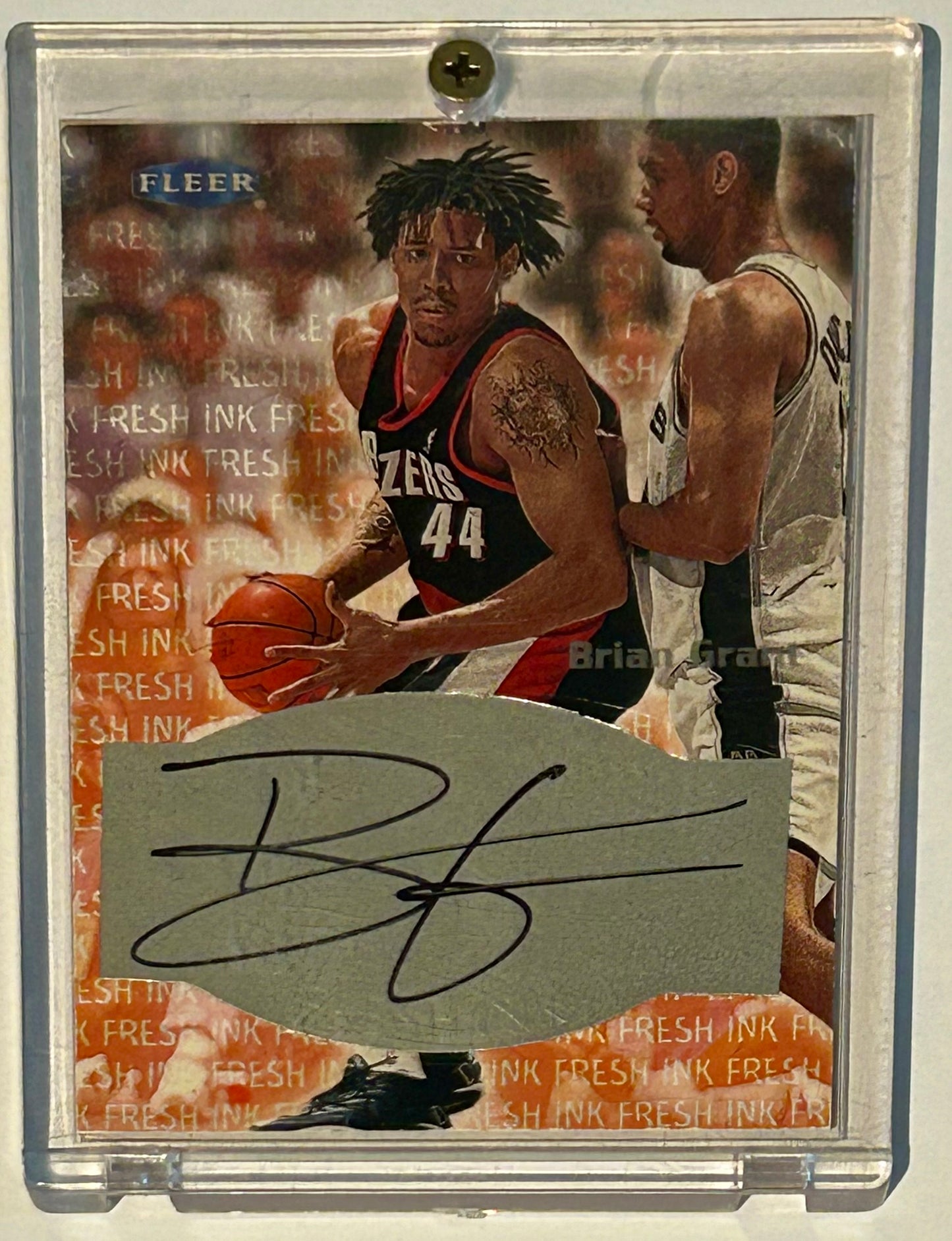 1999-2000 Fleer Brian Grant on card autograph