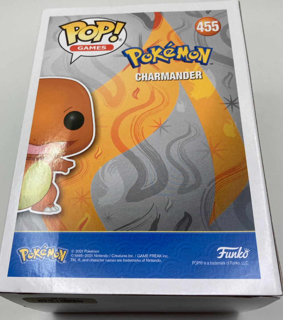 Funko Pop! Metallic Charmander with 5 pokemon card lot