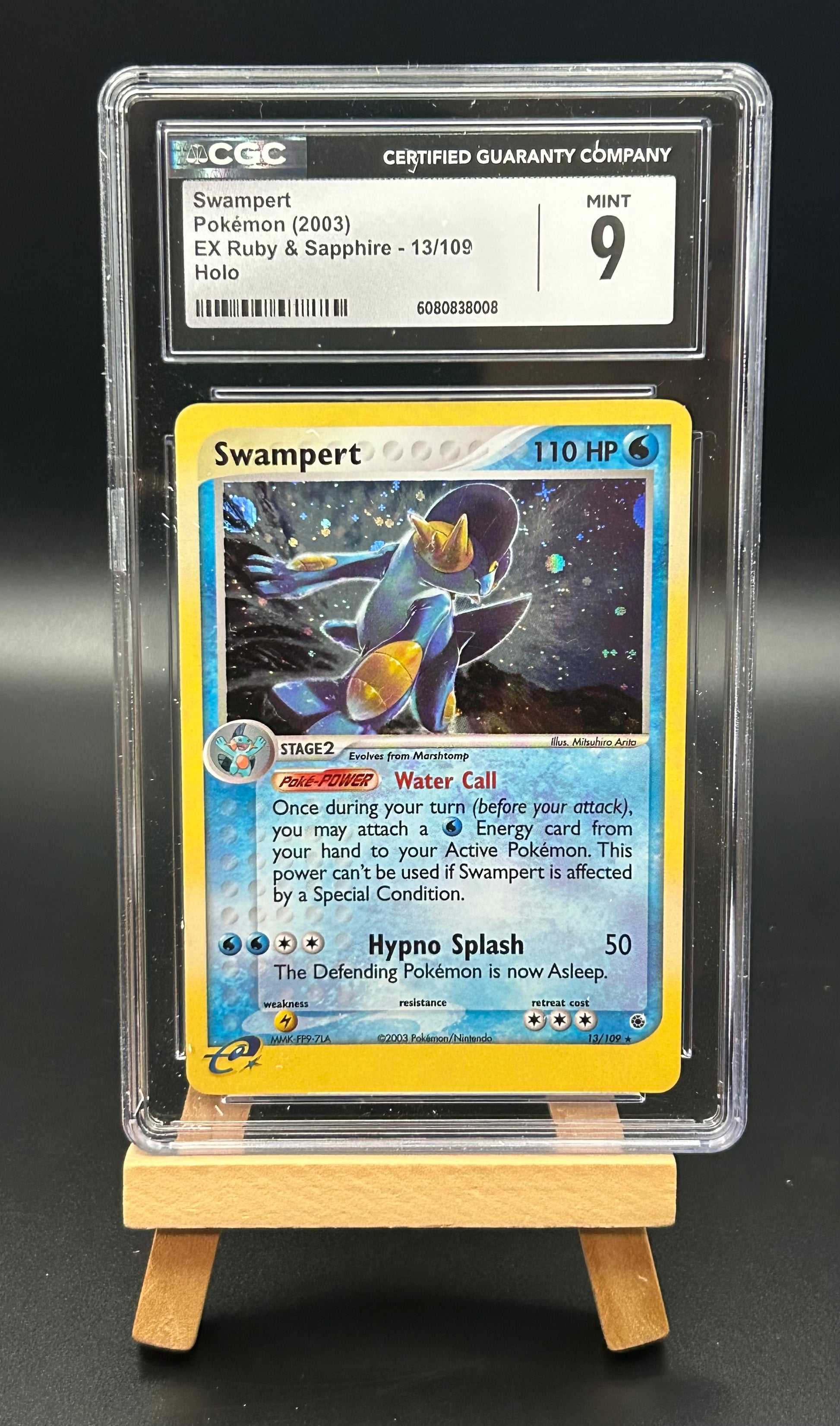Pokémon trading card featuring Swampert in a protective case with a CGC label.